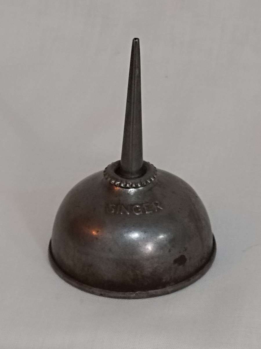 Vintage Singer Sewing machine oil can.