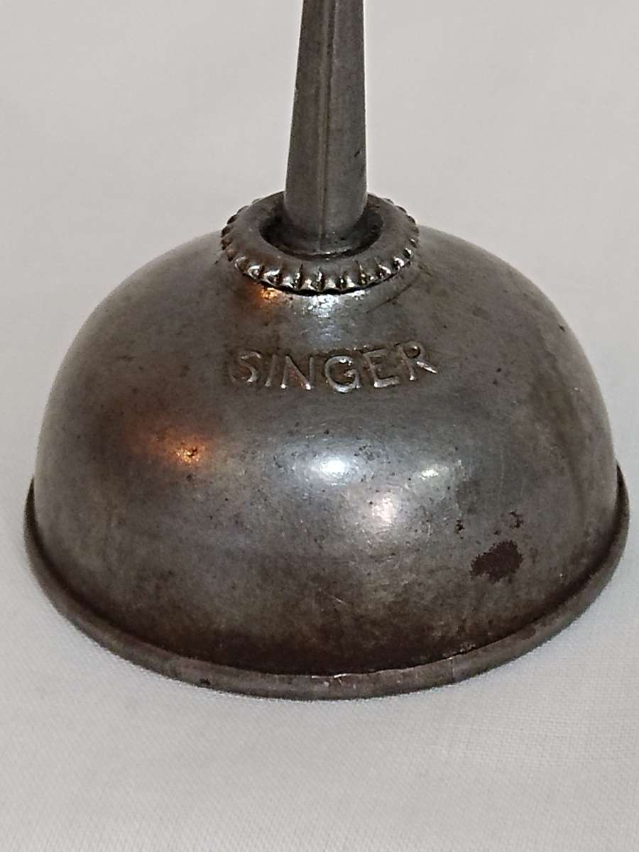 Vintage Singer Sewing machine oil can.