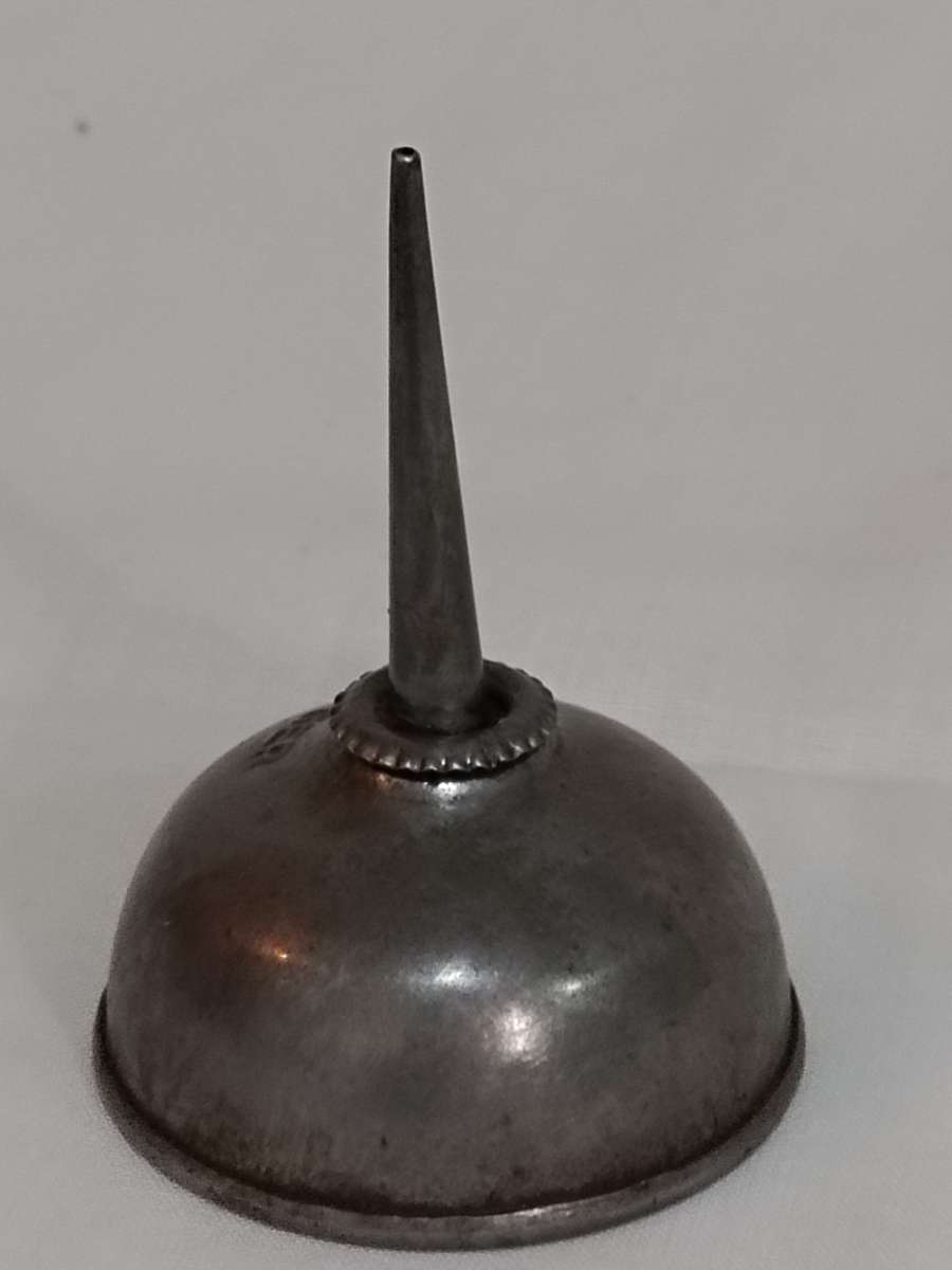 Vintage Singer Sewing machine oil can.