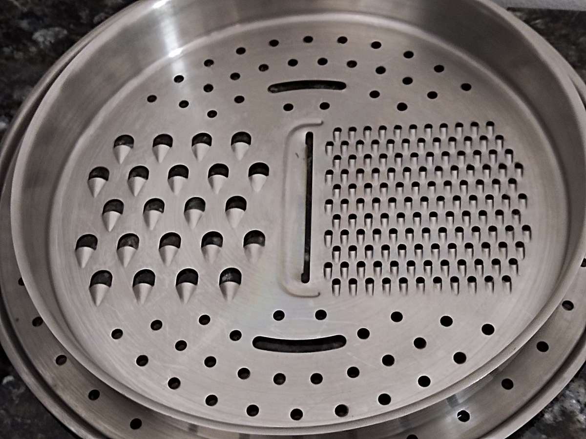 Stainless steel Colander and a steamer/ grater