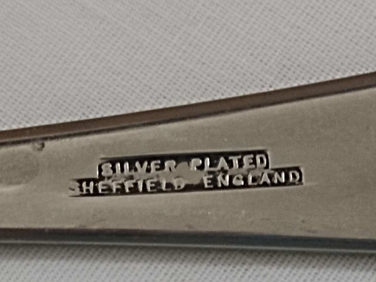 Two pairs of silver plated salad spoons