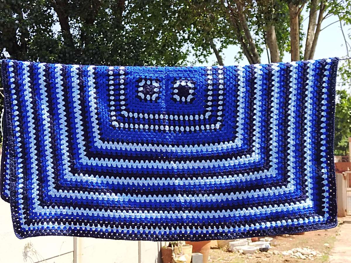 Blue crochet knee blanket