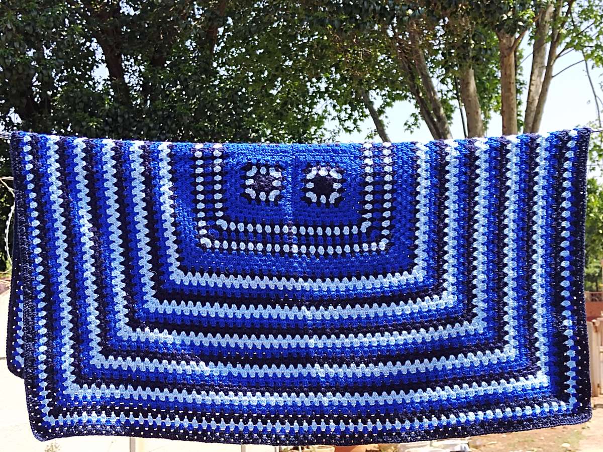 Blue crochet knee blanket