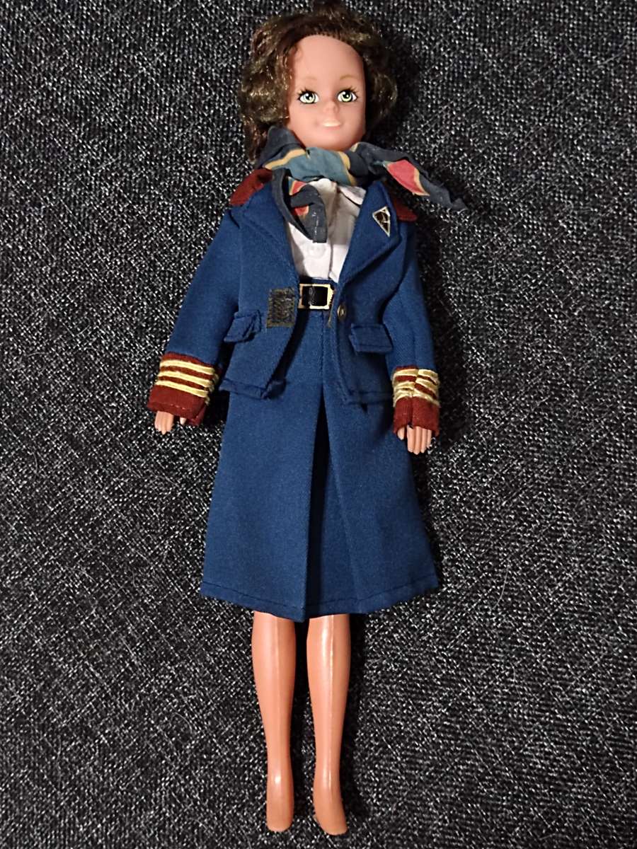 Vintage Qantas Chief Flight Attendant Doll wearing an Yves Saint Laurent Uniform (1989)