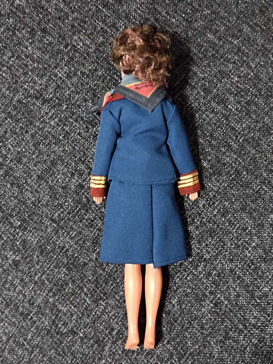 Vintage Qantas Chief Flight Attendant Doll wearing an Yves Saint Laurent Uniform (1989)