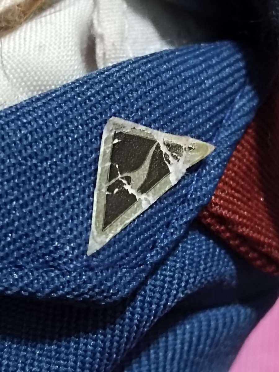 Vintage Qantas Chief Flight Attendant Doll wearing an Yves Saint Laurent Uniform (1989)