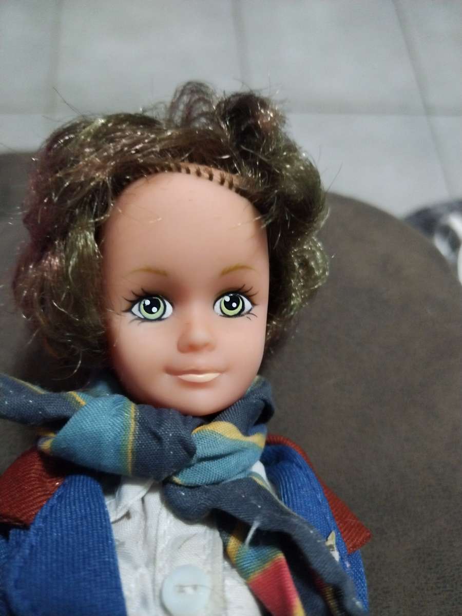 Vintage Qantas Chief Flight Attendant Doll wearing an Yves Saint Laurent Uniform (1989)