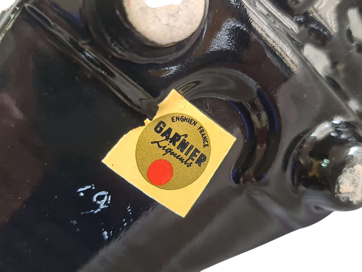 Liquor bottle in the shape of a rugby boot