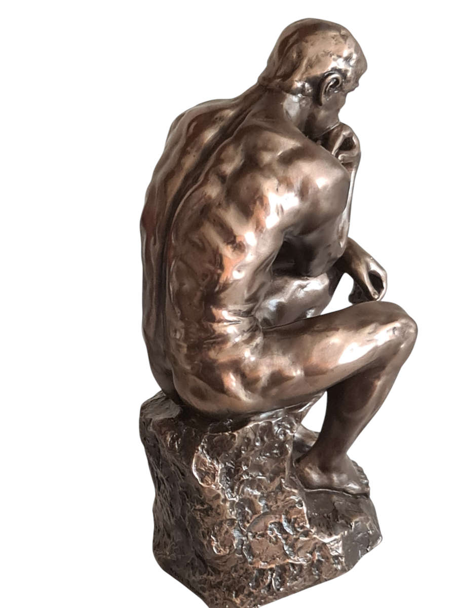 "THE THINKER" figurine. Signed