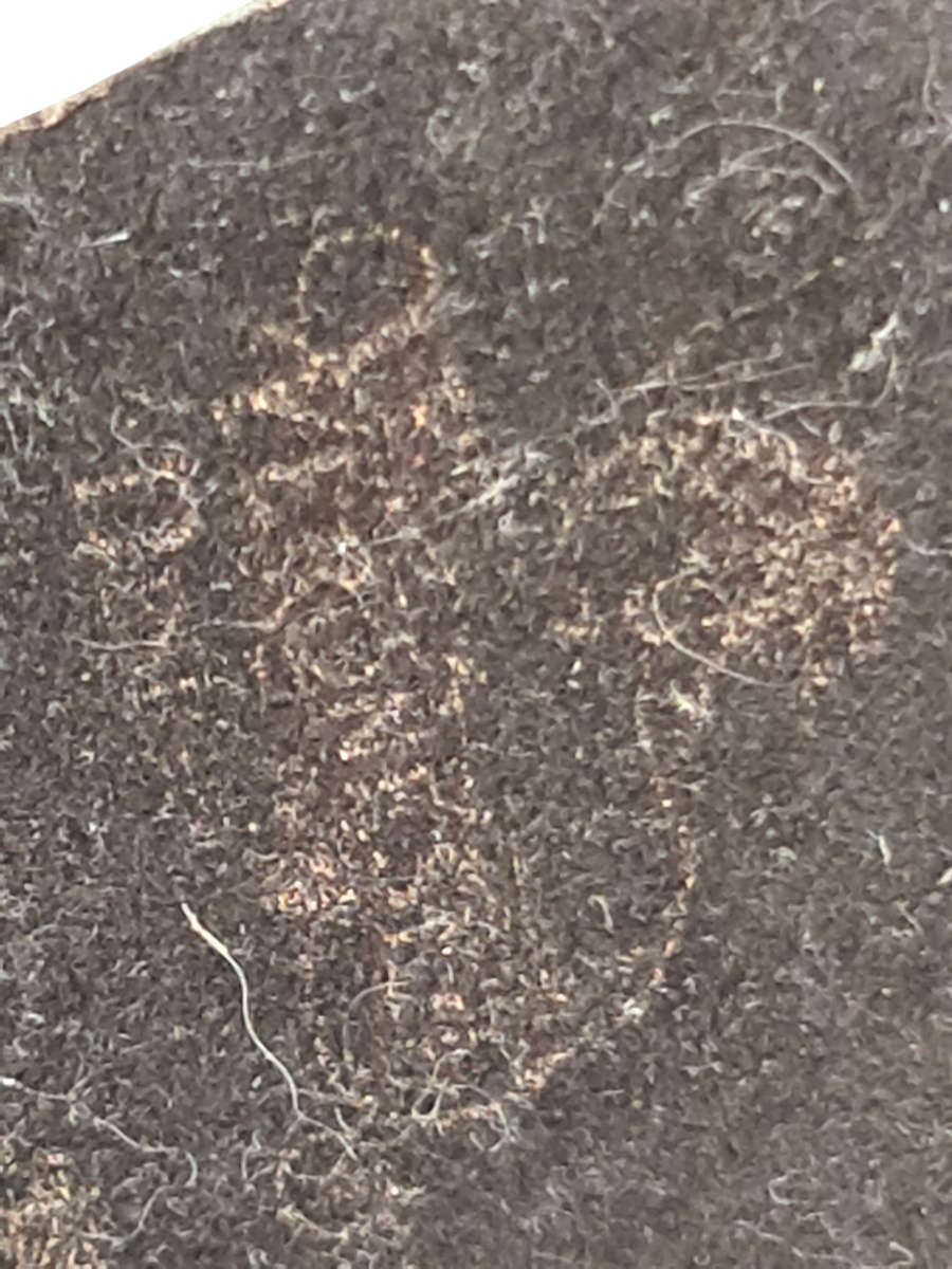 "THE THINKER" figurine. Signed