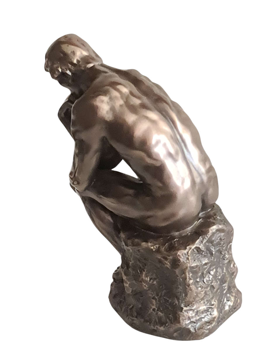 "THE THINKER" figurine. Signed