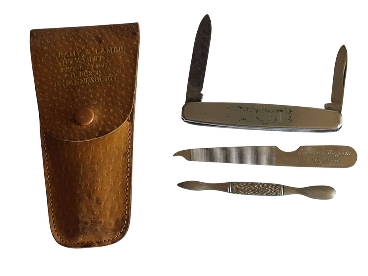 Vintage traveling manicure set in Leather poach. England