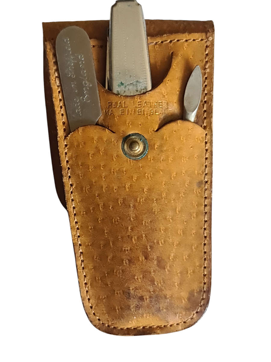 Vintage traveling manicure set in Leather poach. England