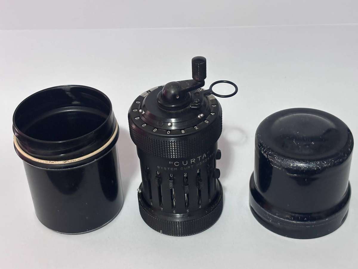 CURTA MECHANICAL CALCULATOR 1930'S. TYPE 1 MADE IN LICHTENSTEIN IN ORIGINAL METAL CASE