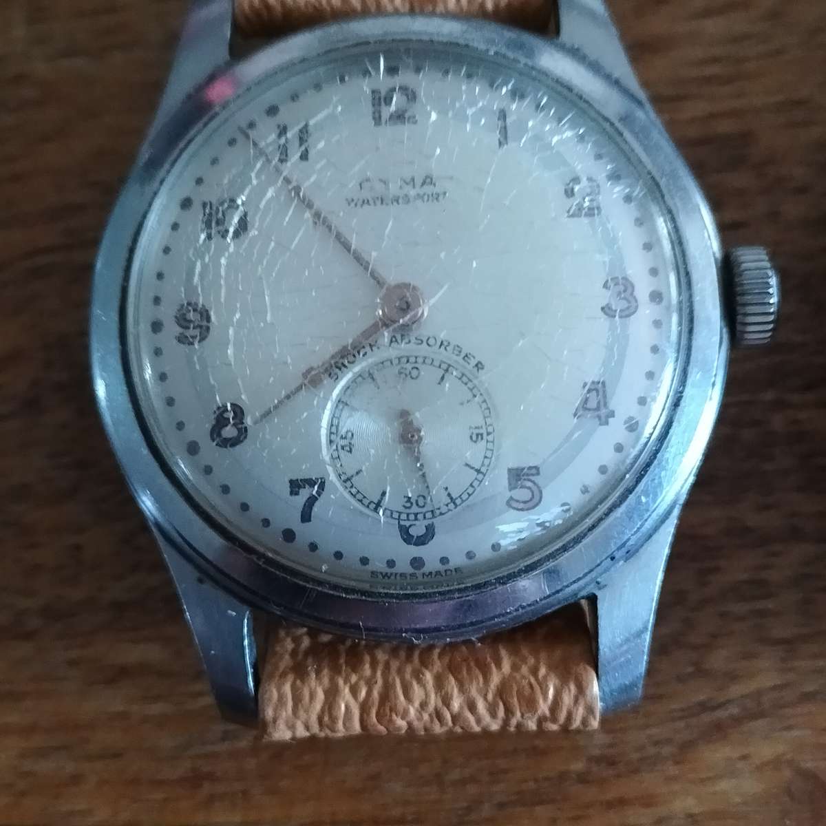 TWO SWISS MEN'S WATCHES. CYMA, DELFIN.