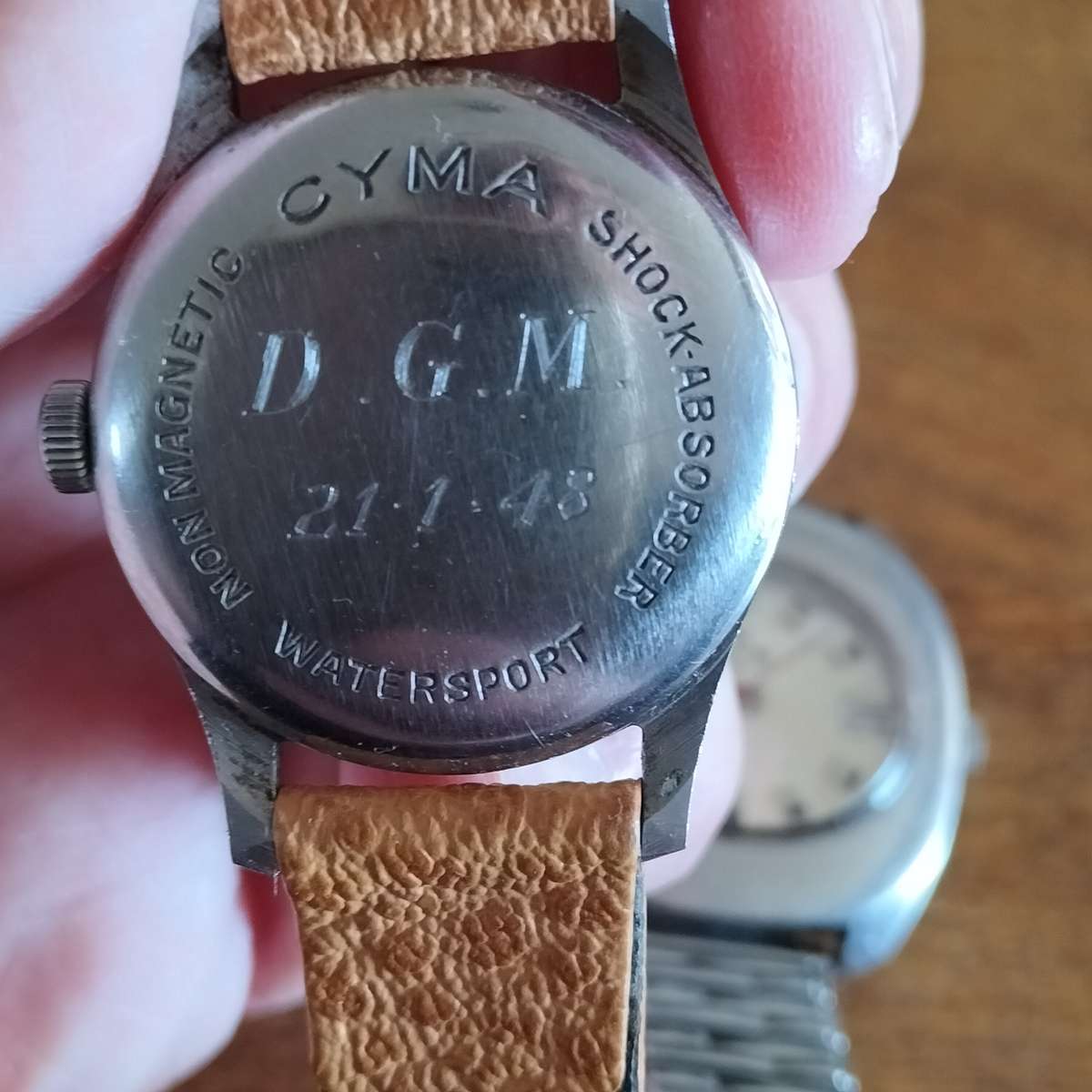 TWO SWISS MEN'S WATCHES. CYMA, DELFIN.