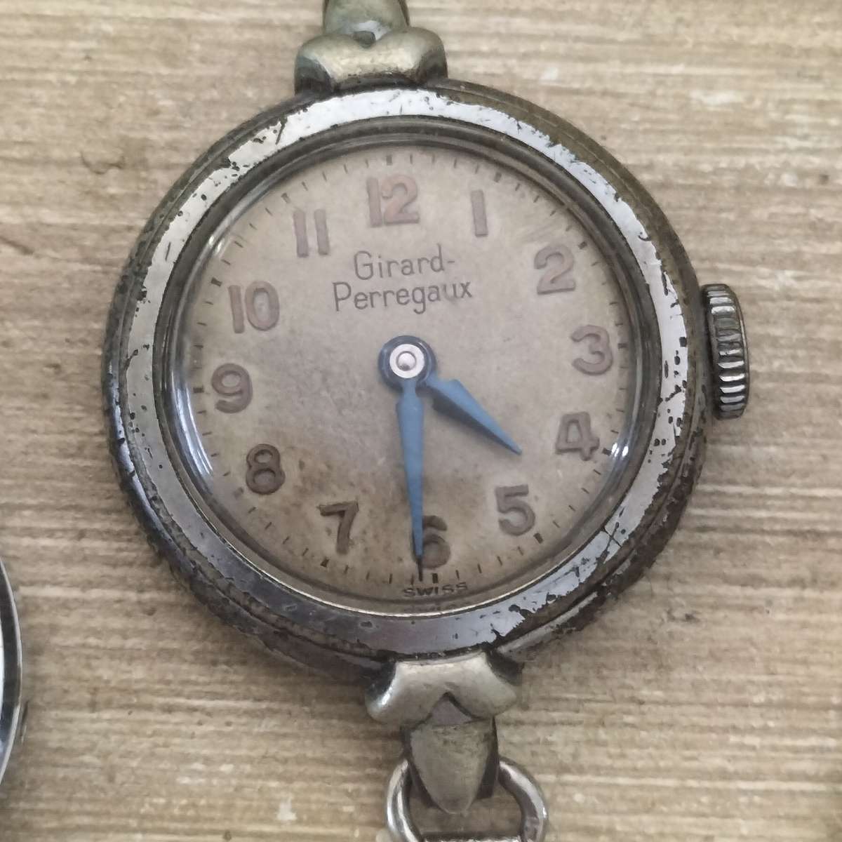 SIX VINTAGE WATCHES.
