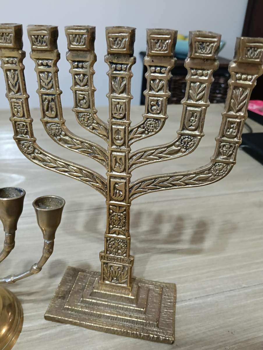 TWO BRASS MENORAH CANDELABRUM.