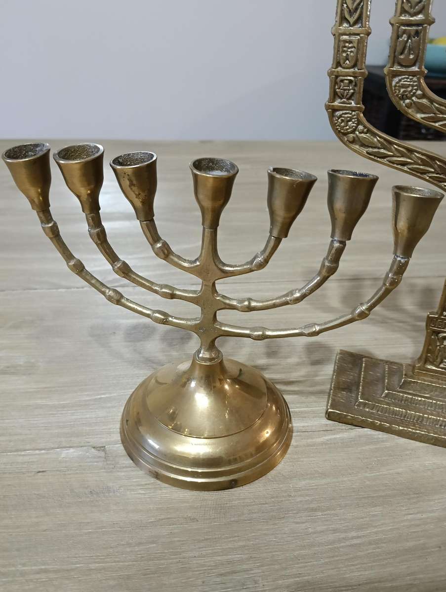 TWO BRASS MENORAH CANDELABRUM.