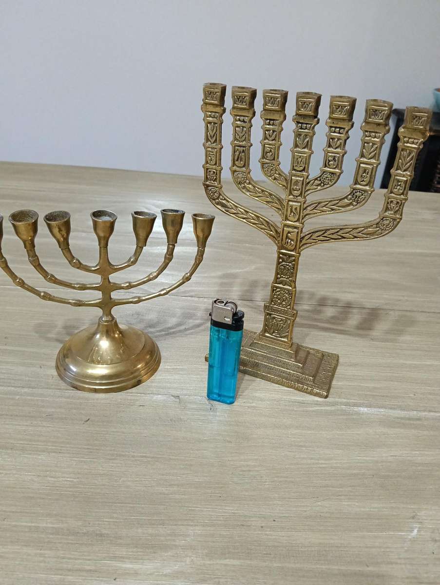 TWO BRASS MENORAH CANDELABRUM.