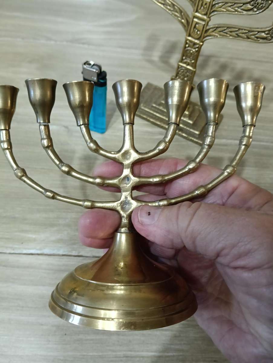 TWO BRASS MENORAH CANDELABRUM.