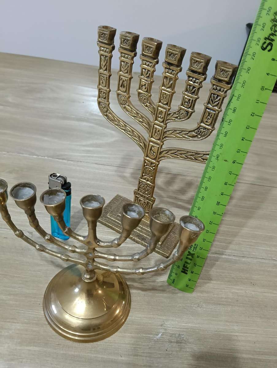 TWO BRASS MENORAH CANDELABRUM.