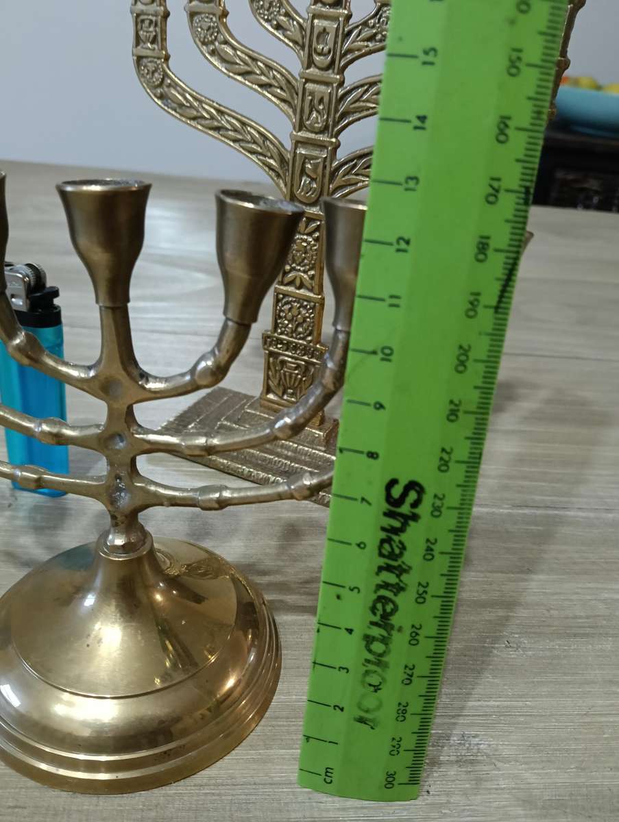 TWO BRASS MENORAH CANDELABRUM.