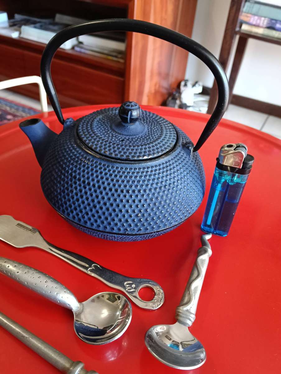 CAST IRON TEA POT. AND C BOYES ITEMS.