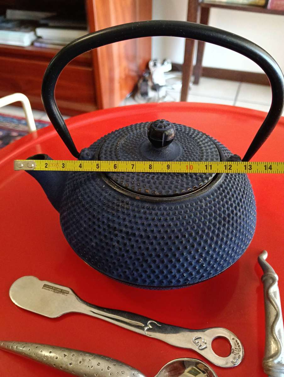 CAST IRON TEA POT. AND C BOYES ITEMS.