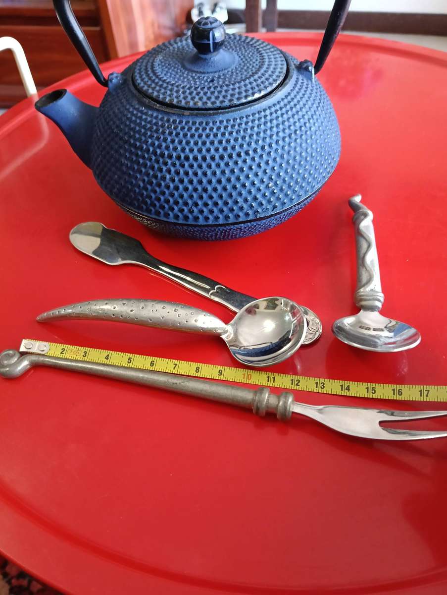 CAST IRON TEA POT. AND C BOYES ITEMS.