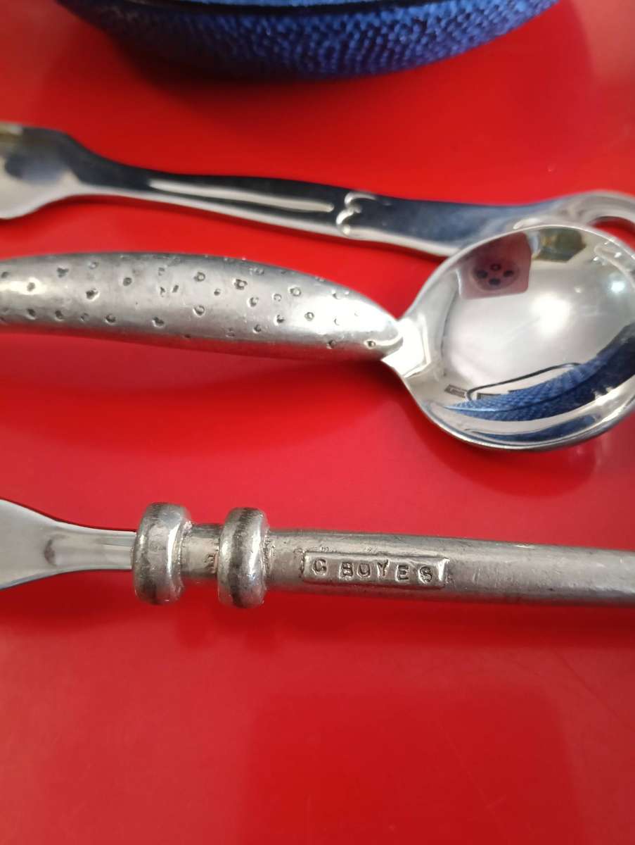 CAST IRON TEA POT. AND C BOYES ITEMS.