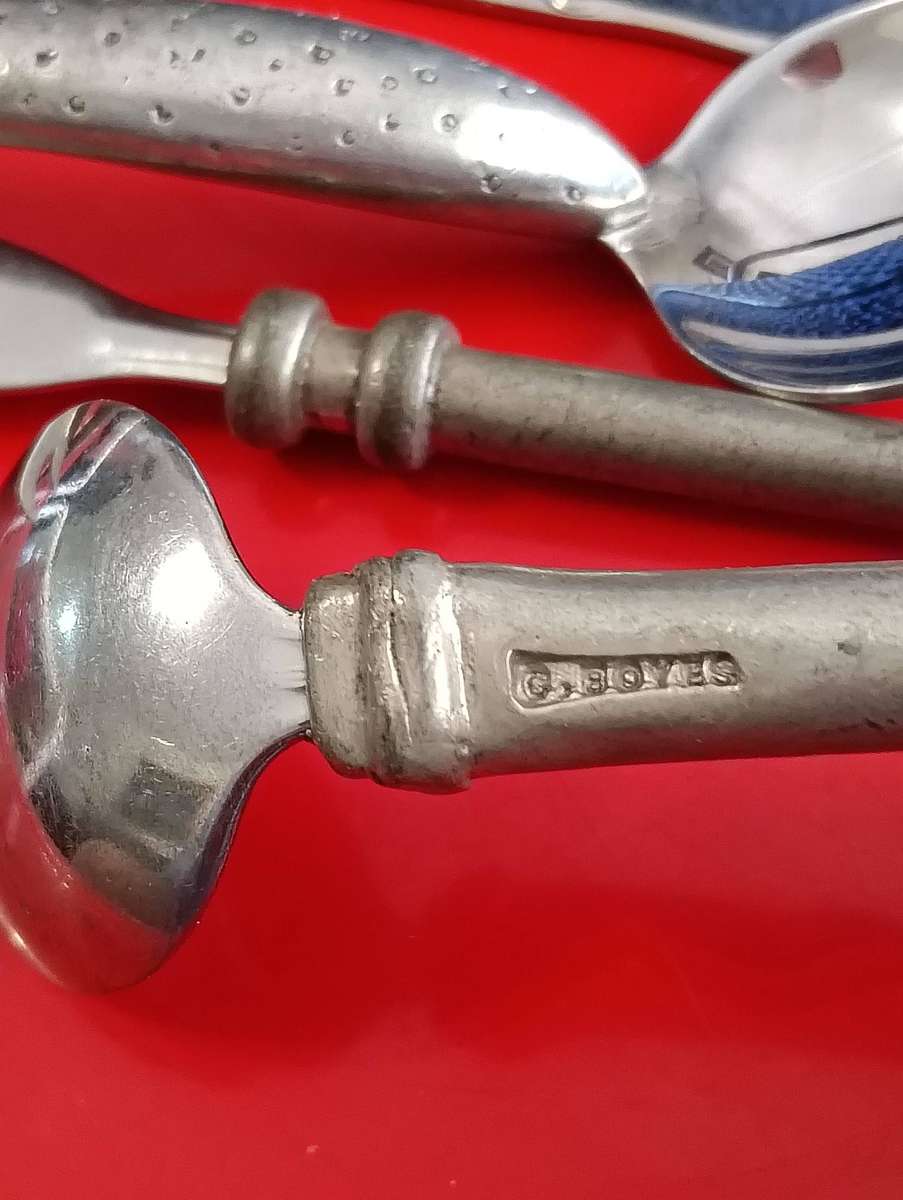 CAST IRON TEA POT. AND C BOYES ITEMS.