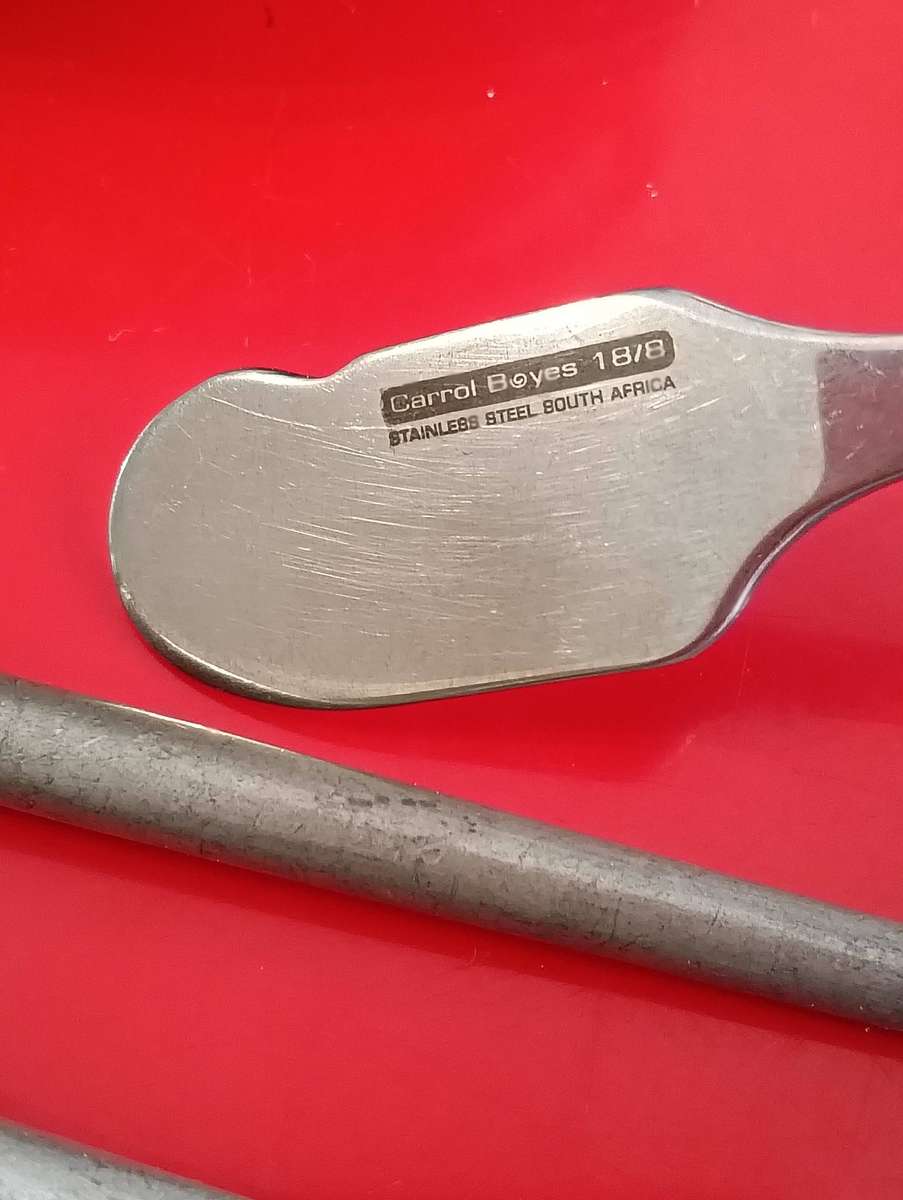 CAST IRON TEA POT. AND C BOYES ITEMS.