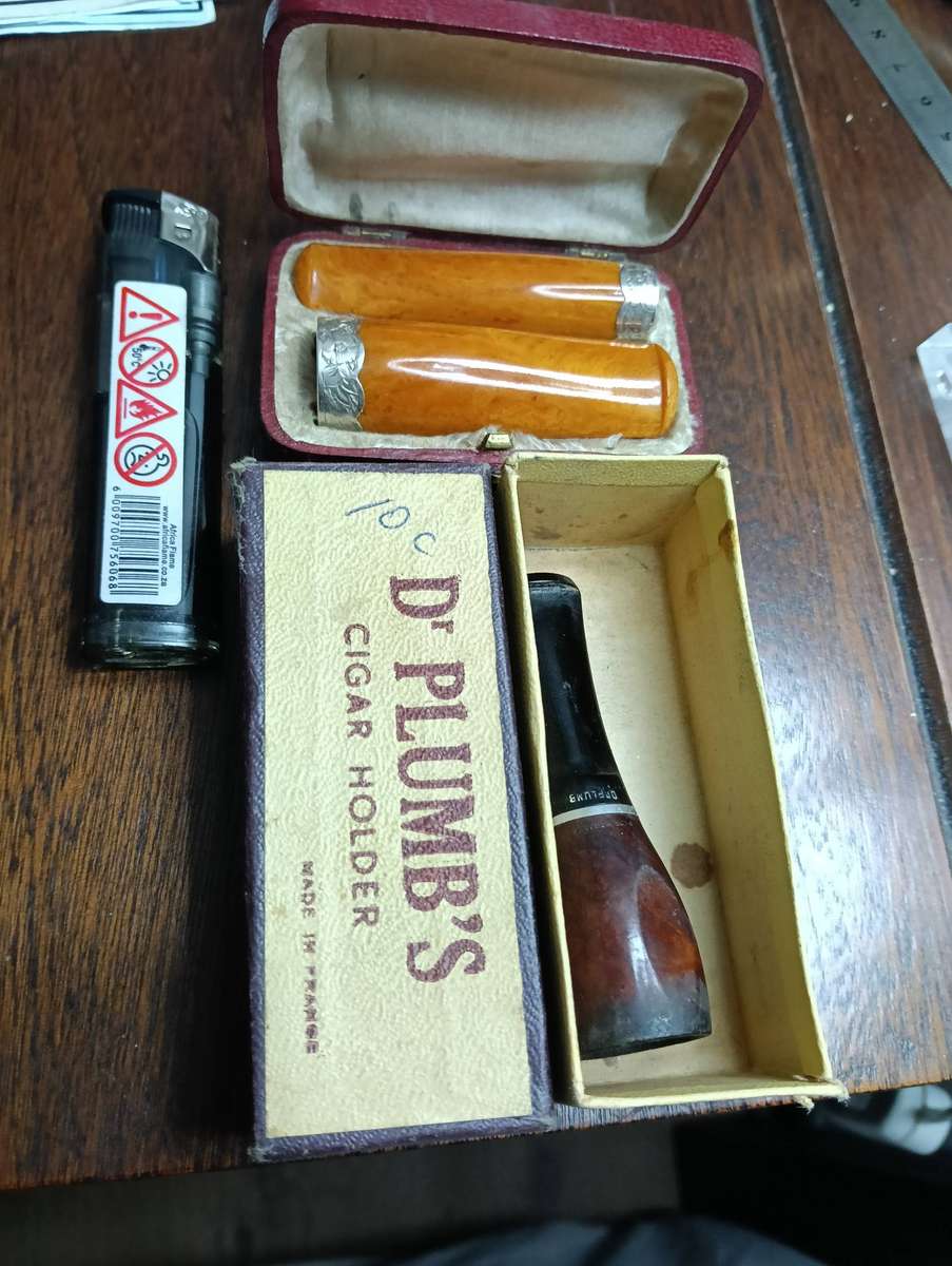 RARE, UNIQUE CIGAR AND CIGARETTE HOLDERS..