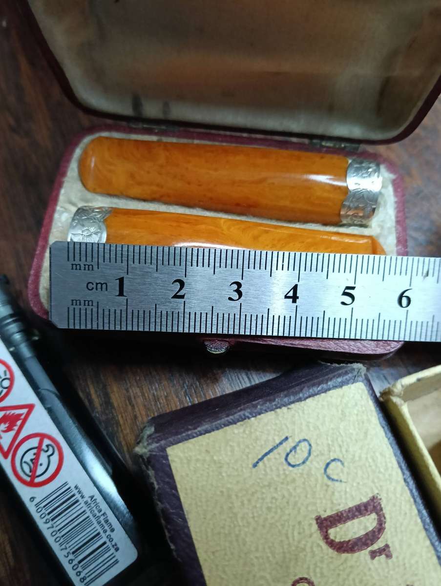 RARE, UNIQUE CIGAR AND CIGARETTE HOLDERS..