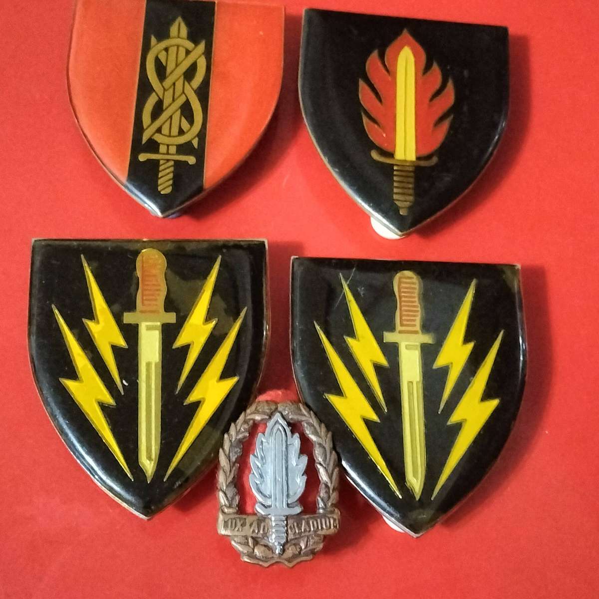 FIVE SADF ARMY BADGES.