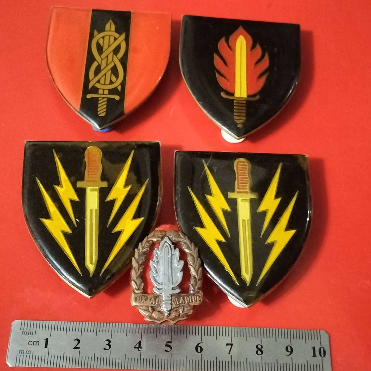 FIVE SADF ARMY BADGES.