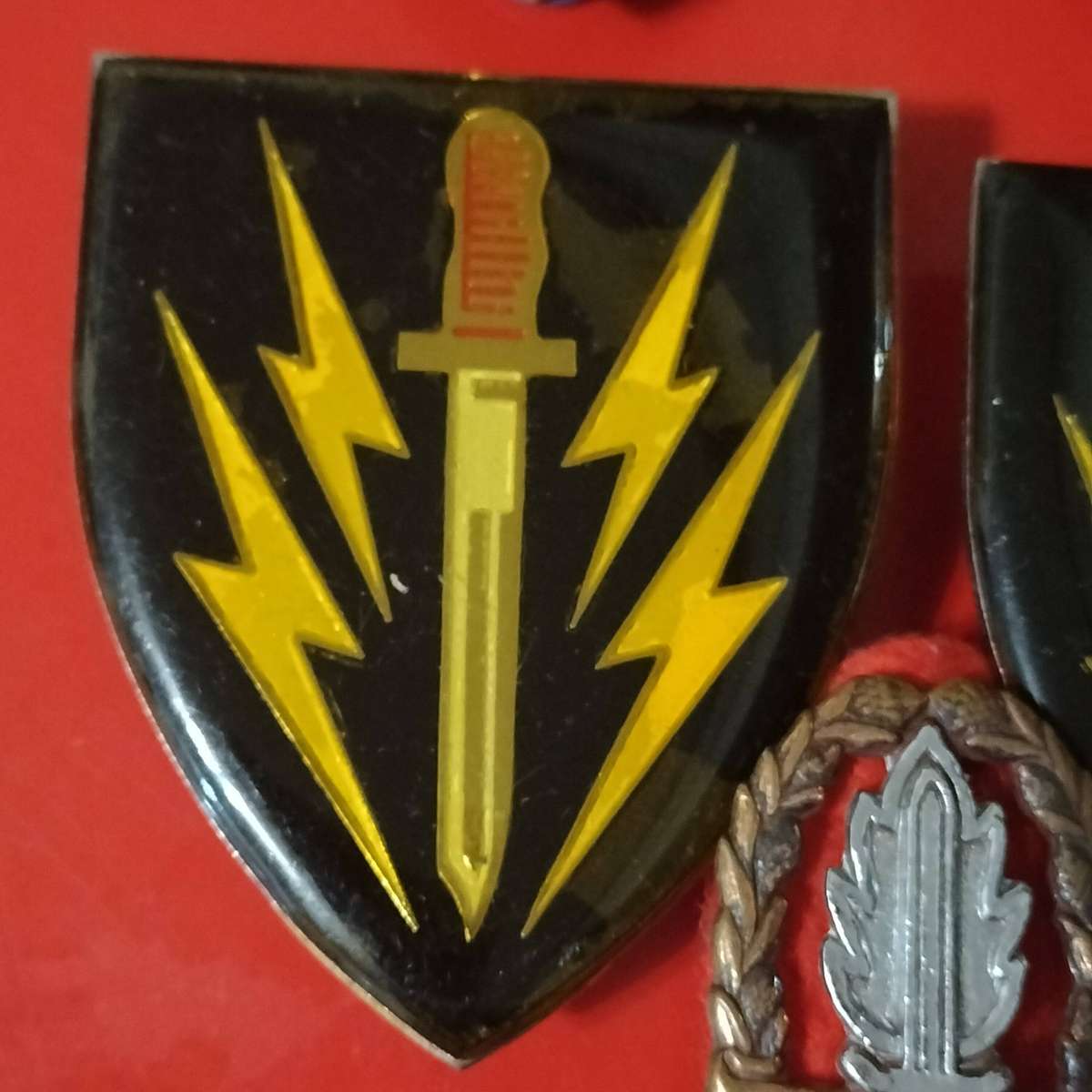 FIVE SADF ARMY BADGES.