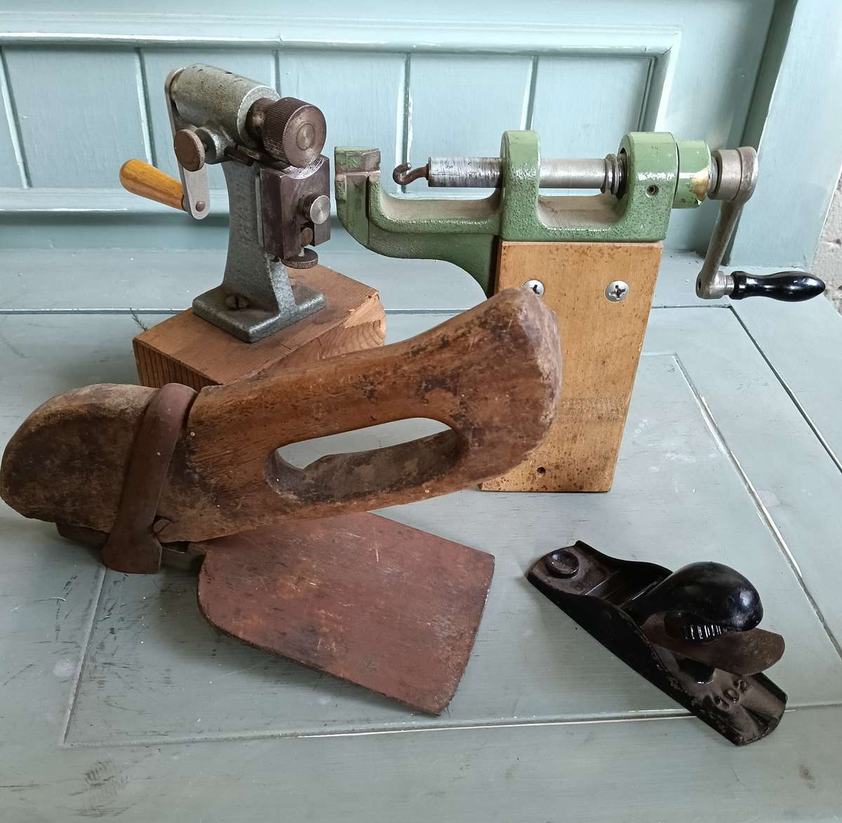 FOUR VINTAGE HAND TOOLS.