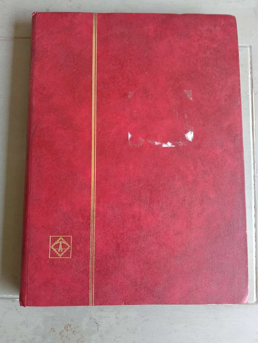 LEUCHTTURM" STAMP ALBUM AND SOME PAGES S A STAMPS.