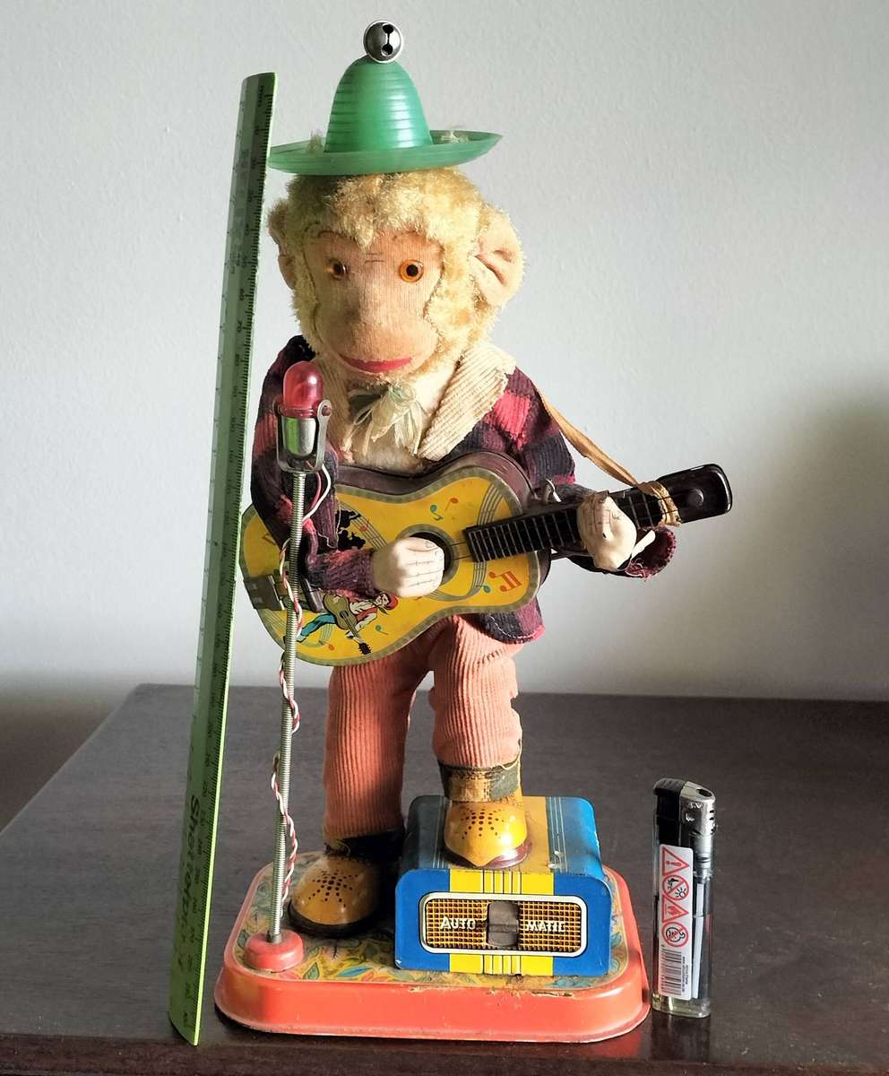 TIN TOY MONKEY. MADE IN JAPAN.