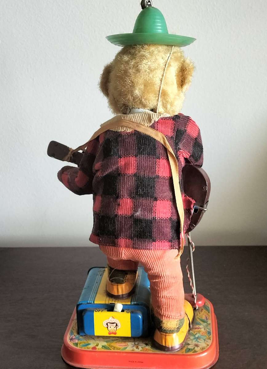 TIN TOY MONKEY. MADE IN JAPAN.