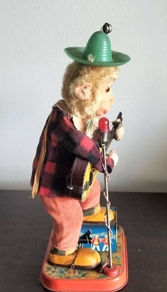 TIN TOY MONKEY. MADE IN JAPAN.