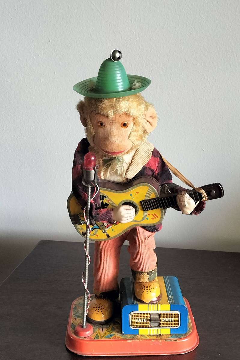 TIN TOY MONKEY. MADE IN JAPAN.