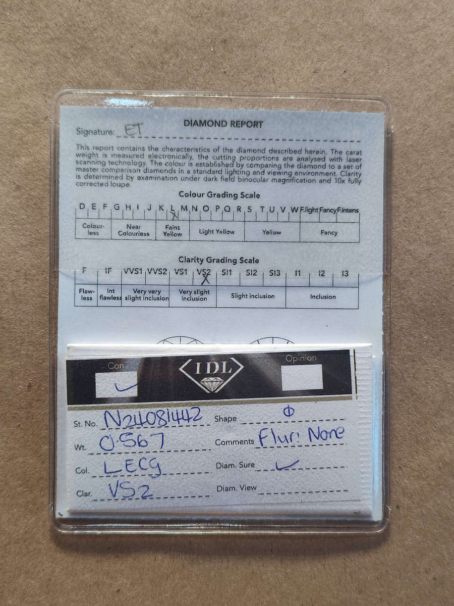 Natural Cerified Round brilliant Diamond. .56. VS2 L ECG