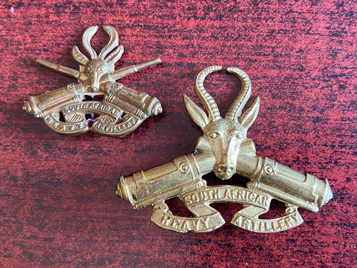 SA HEAVY ARTILLERY,GILDING METAL HELMET BADGE AND ONE COLLAR (EARS UP TYPE)WORN 1915-1919-LUGS ON CA