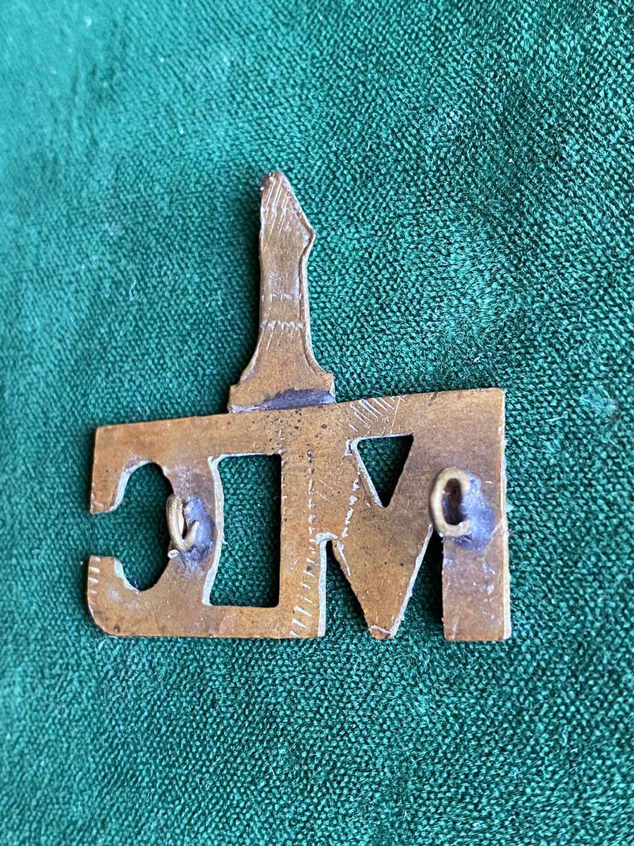 1ST MILITARY CONSTABULARY (SOUTH WEST AFRICA) SHEET METAL TITLE-WORN DURING 1914-15- 2 LUGS