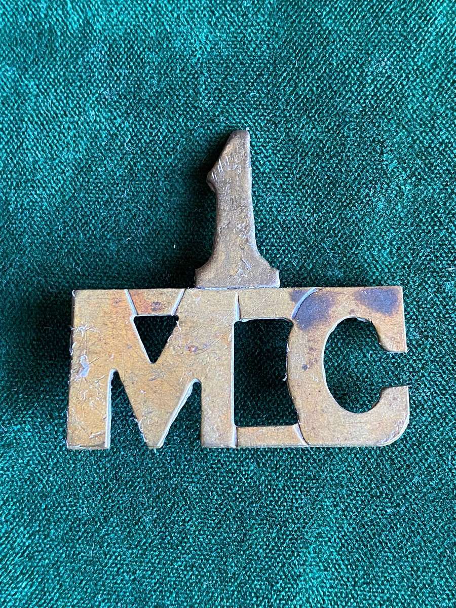 1ST MILITARY CONSTABULARY (SOUTH WEST AFRICA) SHEET METAL TITLE-WORN DURING 1914-15- 2 LUGS