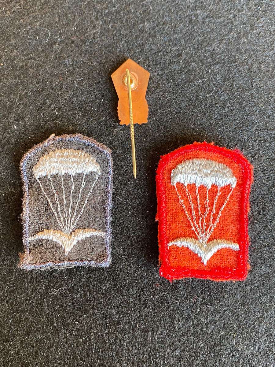 EAST GERMAN PARA BERET BADGES RED (OFFICERS) BLACK (NCO'S) COMES WITH PARACHUTE STICK PIN-SOLD TOGET