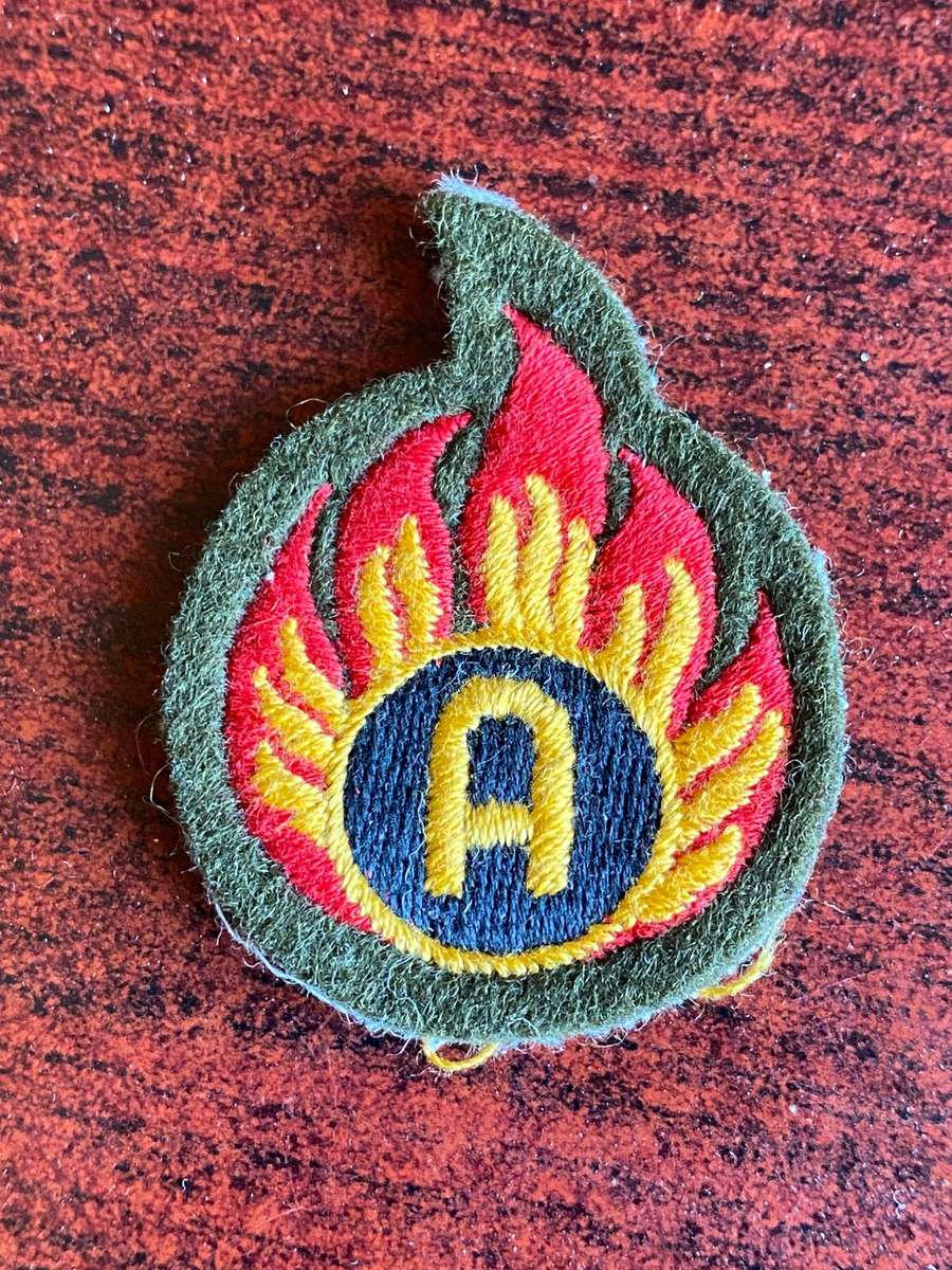 RHODESIAN ENGINEERS EXPLOSIVE ORDNANCE DISPOSAL BADGE FOR FIELD DRESS 1970'S- 80